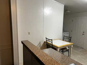 Dining area with washer / clothes dryer