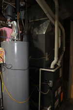 Duplex # A Utility room featuring water heater