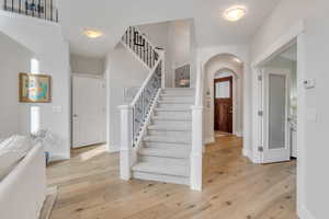 Grand Staircase and beautiful wide plank hardwood floors throughout main level