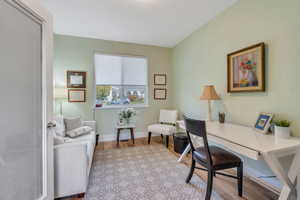 Front office with french doors by home entry.