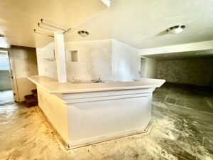 Bathroom featuring concrete floors