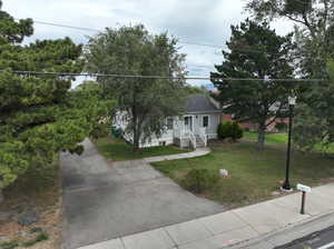 View of front of property with a front yard