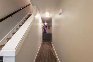 Hall featuring dark hardwood / wood-style flooring