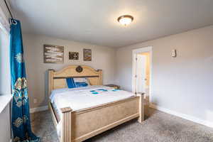 View of carpeted bedroom