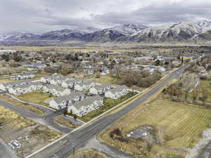 Birds eye view of property with a mountain view