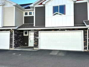 View of front of home with a garage