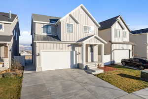 View of front of house with a garage