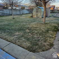 View of yard featuring an outdoor structure