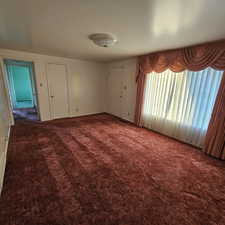 View of carpeted spare room