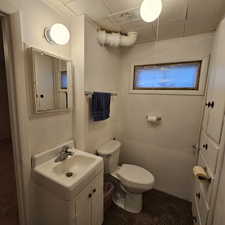 Bathroom with vanity and toilet