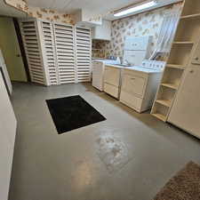 Kitchen featuring washer and dryer