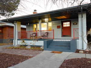 Entrance to property with a porch