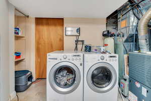 Washroom with washing machine and dryer