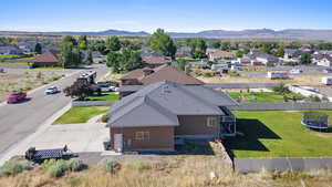 Birds eye view of property with a mountain view