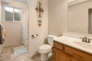 Bathroom with vanity and toilet