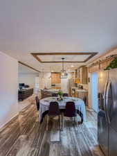 Dining room with wood-type flooring