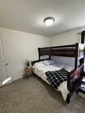#4 Bedroom is light and bright with west facing window and featuring carpet.