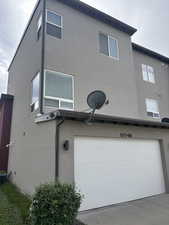 View of back west facing two car garage.