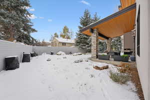 View of yard covered in snow