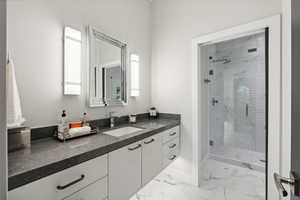 Bathroom with vanity and walk in shower