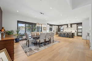 Dining space featuring light wood-type flooring