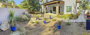 View of yard with a patio