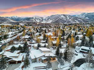 Snowy aerial view with a mountain view