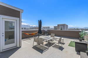 View of patio / terrace featuring a mountain view