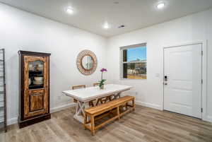 Dining area featuring light hardwood / wood-style floors