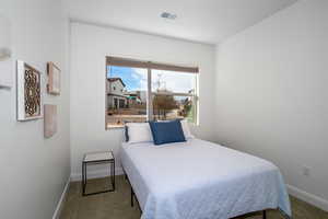 View of carpeted bedroom