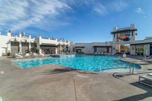 View of pool with a patio area