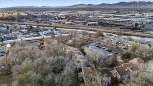 Birds eye view of property with a mountain view