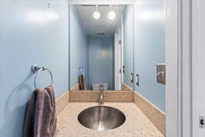 Bathroom with vanity and toilet