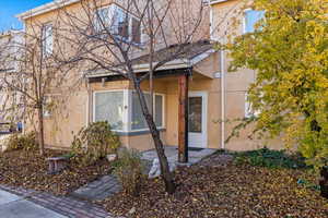 View of front of home featuring a patio area