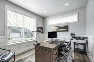 Office space featuring a healthy amount of sunlight and light hardwood / wood-style floors