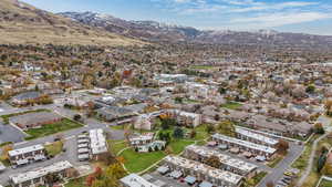 Birds eye view of property with a mountain view