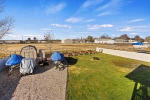 View of yard featuring a storage shed