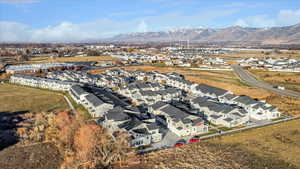 Birds eye view of property with a mountain view