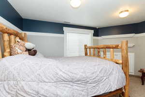 Bedroom with carpet flooring