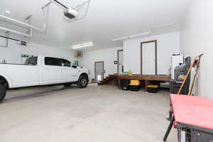 Garage featuring a garage door opener