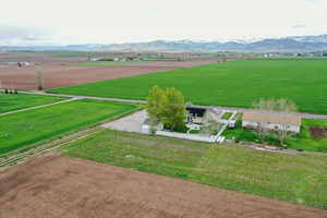 Drone / aerial view featuring a mountain view and a rural view