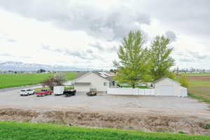 Exterior space featuring a mountain view and a garage