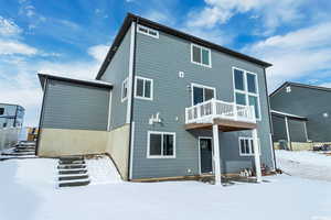 View of snow covered property