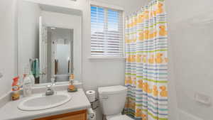 Bathroom with vanity and toilet