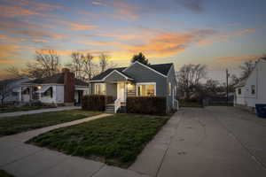 View of front facade with a lawn