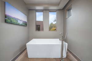 Bathroom with a washtub