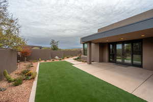 View of yard with a patio area