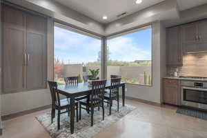 Dining area featuring a healthy amount of sunlight