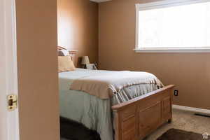 View of carpeted bedroom