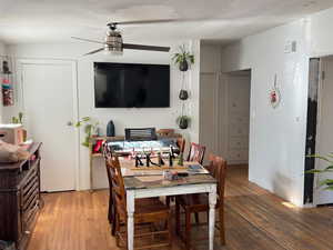 Dining room featuring hardwood / wood-style floors and ceiling fan